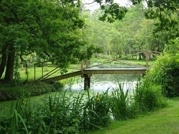 Bridge over the water at Fairhaven Woodland and Water Garden