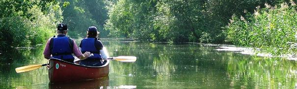 Couple in a canoe on The Broads