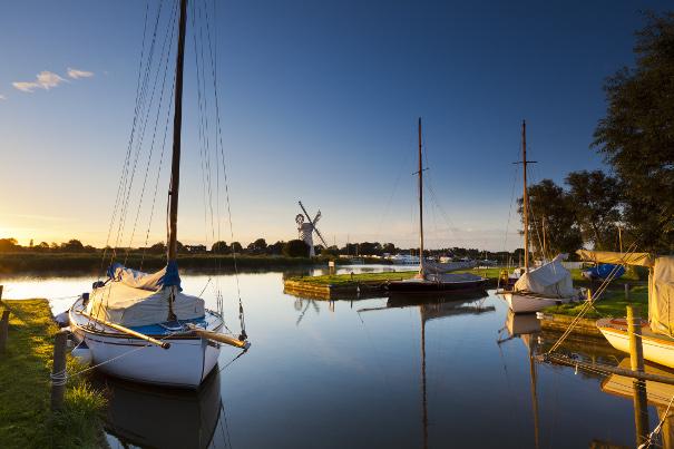 Boats on the water in the Broads National Park