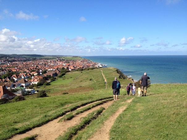 Walkers on the Beeston Bump Coastal Path