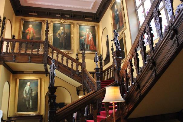 View of the staircase and portraits in Blickling Hall