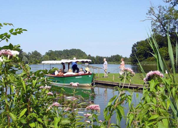 People on a boat at Fairhaven Garden