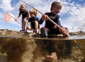 Children rockpooling in North Norfolk