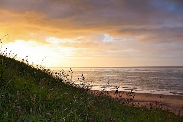 View of Trimingham Beach at sunset